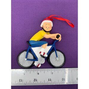 2015 Ornament Central Christmas Tree Hanging Boy on a Bike Red Helmet Yellow Shi